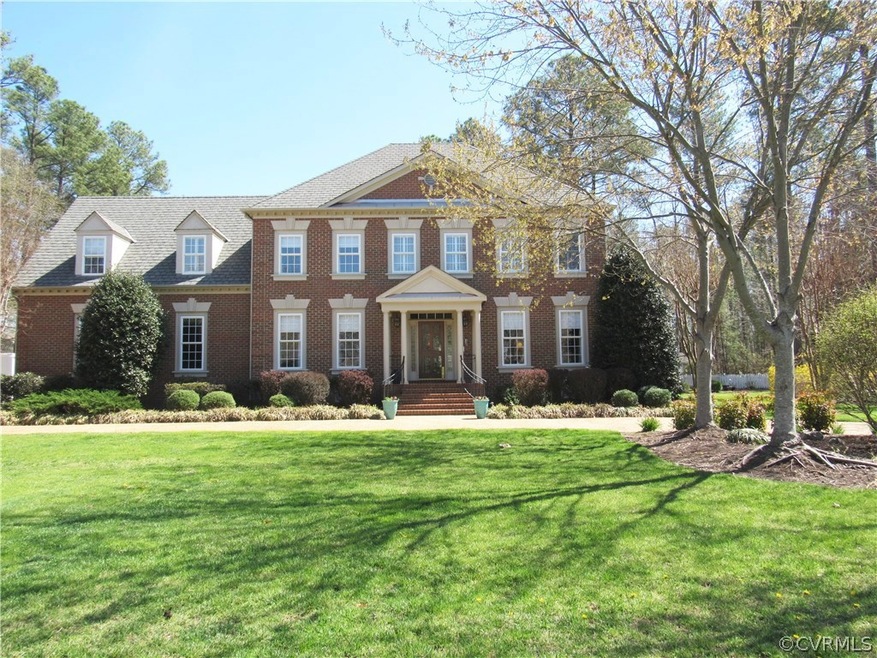 Gorgeous custom home on 1 acre lot with circular d