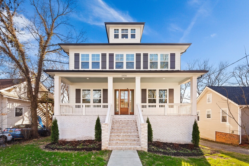 Welcome home! This stunning East Nashville residence offers beautiful curb appeal and an inviting front porch. All that’s left is your rocking chairs!