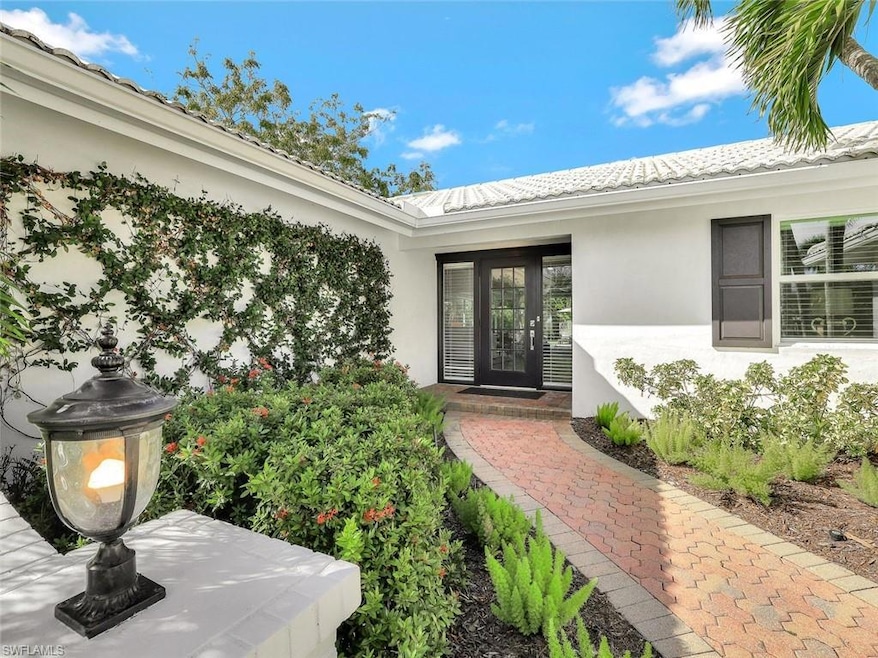 79 Burning Tree Dr, Naples, FL 34105 - photo 1