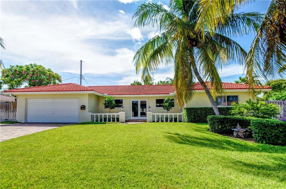 Beautifully landscaped front lawn and charming ent