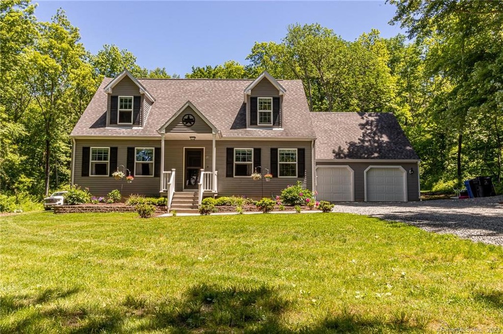 set back from the road, professionally landscaped 