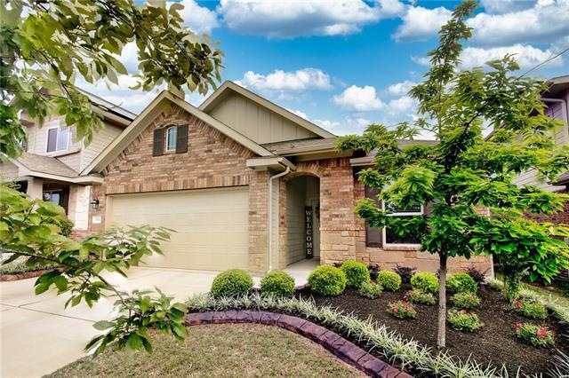 Lush gardens and landscaping greet you