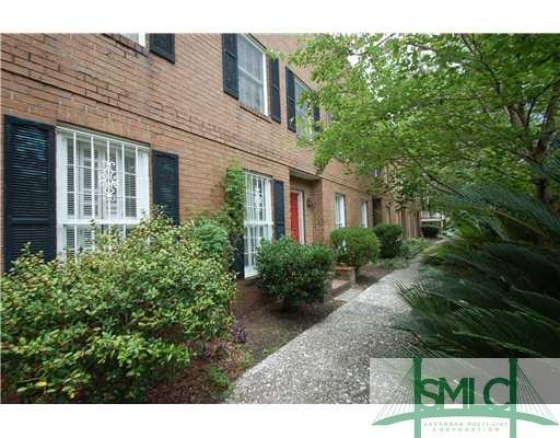Exterior Front. Solid brink row built in 1978 By A