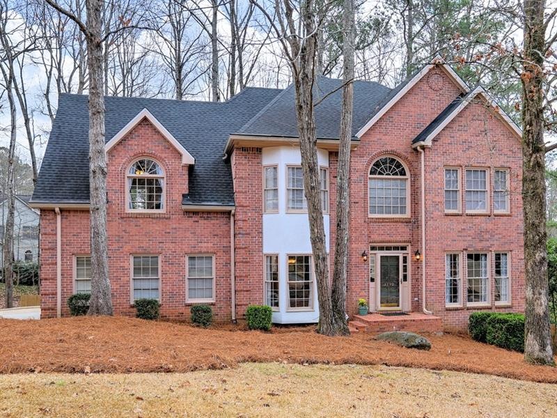 Handsome 3 Sided Brick Traditional with room to ro
