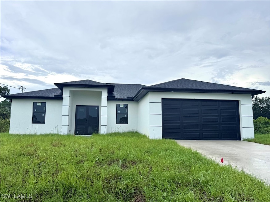 3304 67th St W, Lehigh Acres, FL 33971 - photo 1