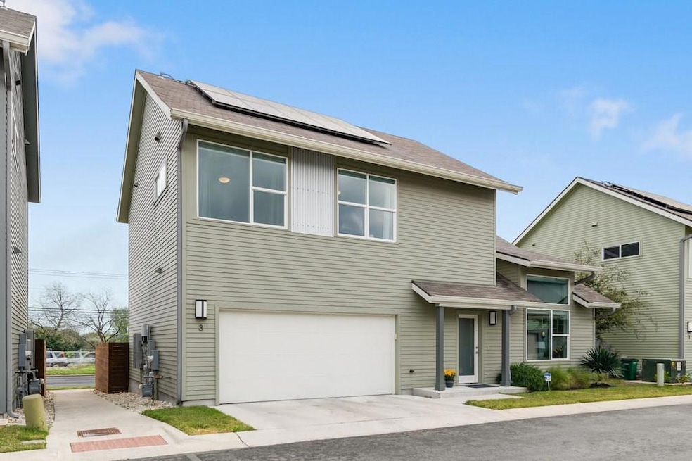 View of front of house featuring roof mounted sol