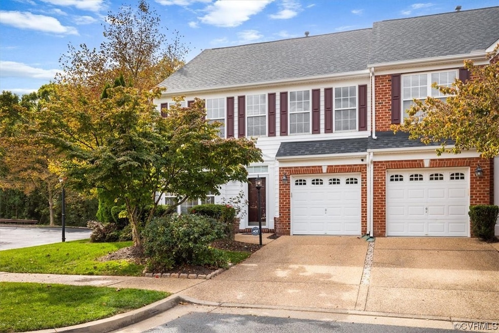 View of property featuring a garage