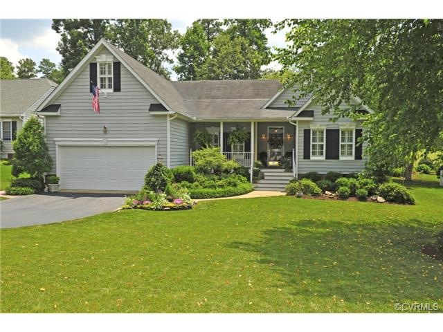 Facade with maintenance free vinyl siding, two car