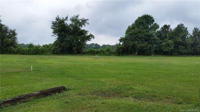 Beautiful flat lot surrounded by trees.