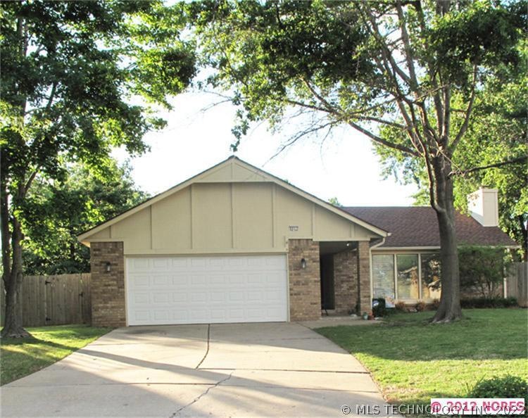 Located in quiet cul-de-sac with mature trees.