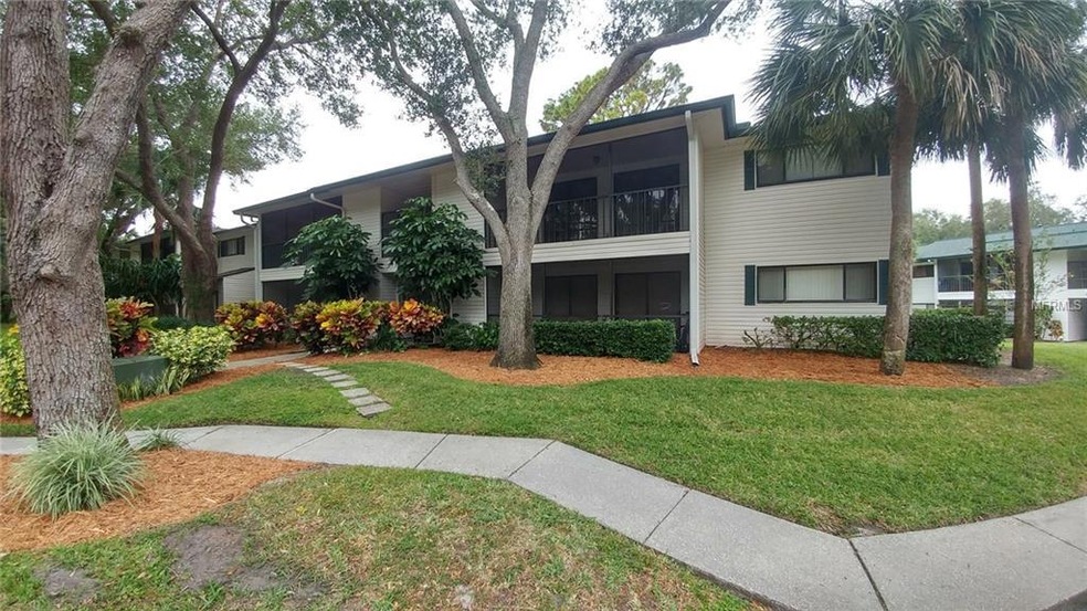 3259 Fox Chase Cir N unit 208, Palm Harbor, FL 34683 - photo 1
