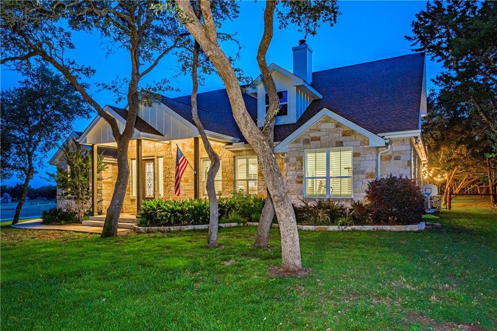 Classic Hill Country style with spacious front porch. The American flag nostalgic to front porch living.