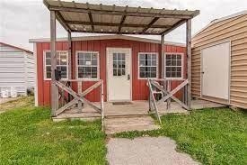 View of outdoor structure featuring an outbuilding