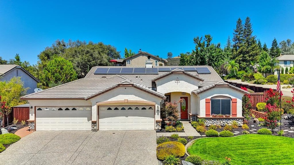 Beautiful SINGLE STORY with a FOUR CAR GARAGE has solar and a pool and spa