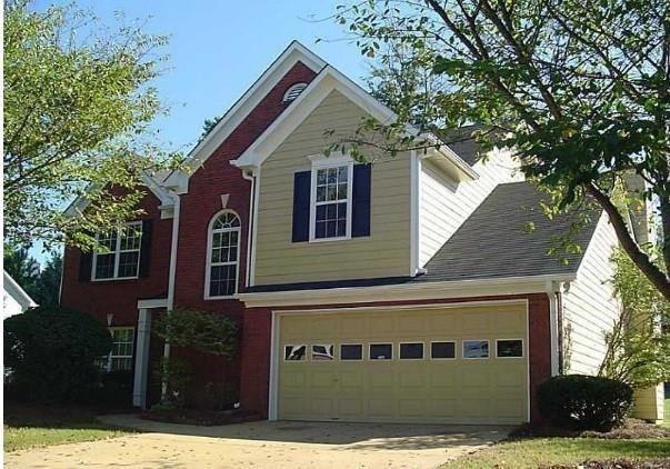 View of front of house featuring a garage