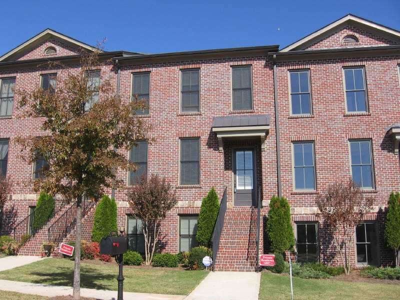 Exterior Front. This beautiful townhome is conveni