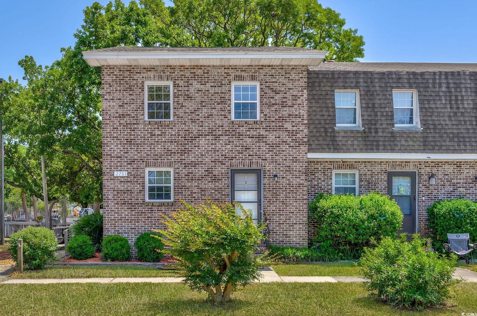Multi unit property featuring roof with shingles, 