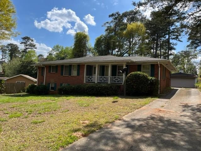 View of front of home featuring covered porch and 