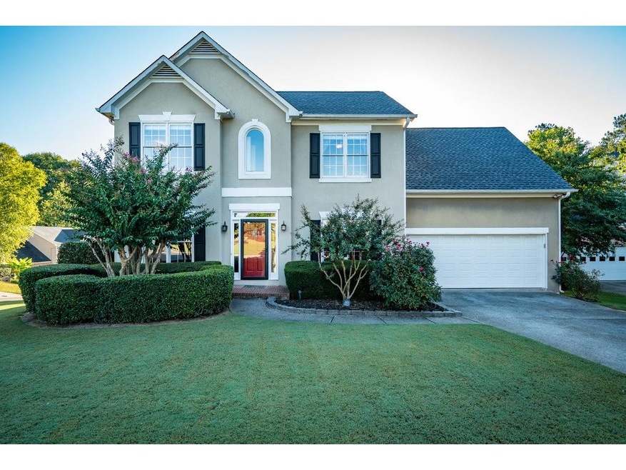 A STUNNING FOUR BEDROOM HOME IN THE JOHNS CREEK AR