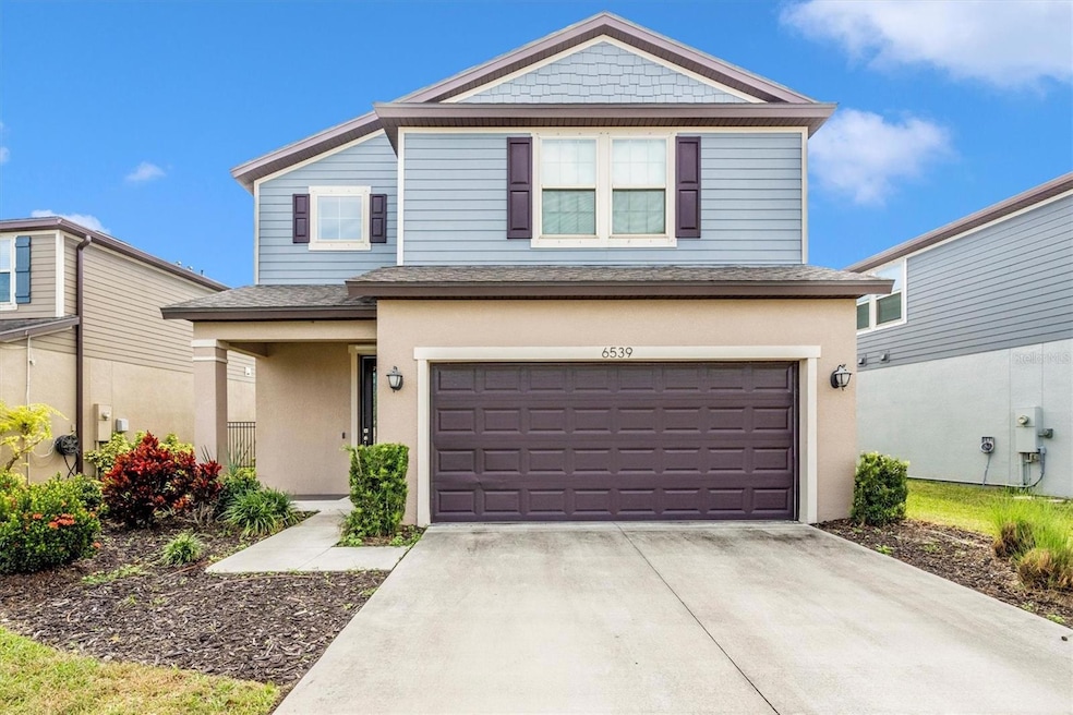 4 bedroom, 3 bathroom, 2 car garage, screened rear porch and fully fenced yard.