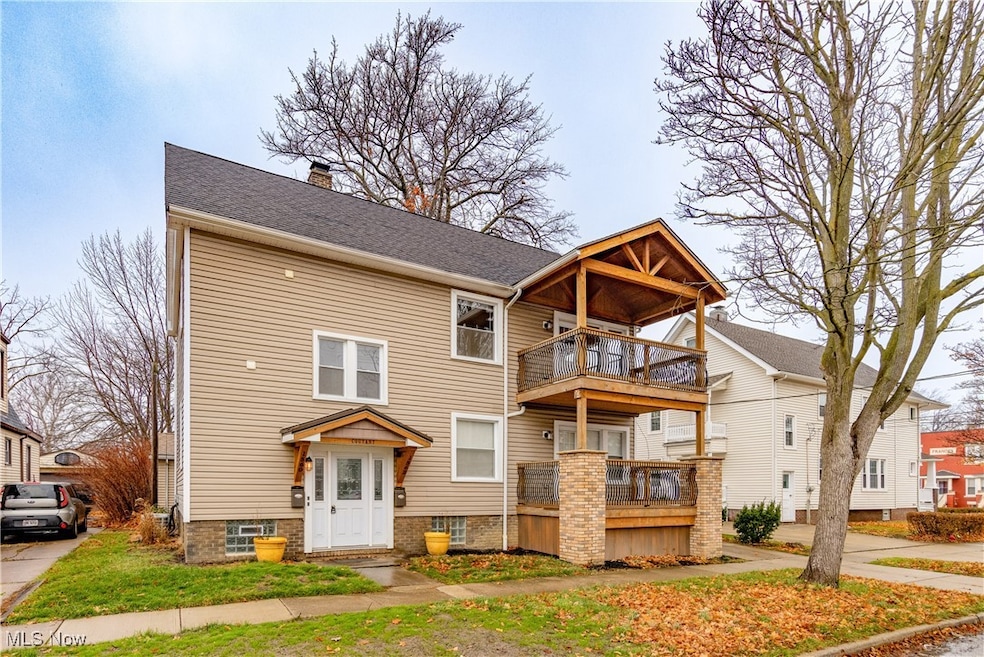 View of front of home with a balcony