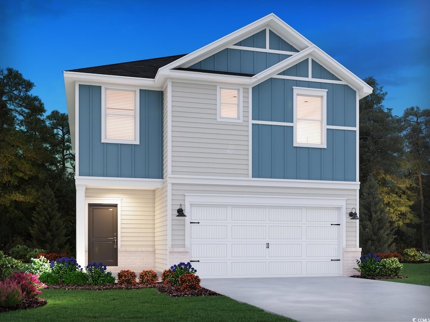 View of front facade featuring driveway, board and