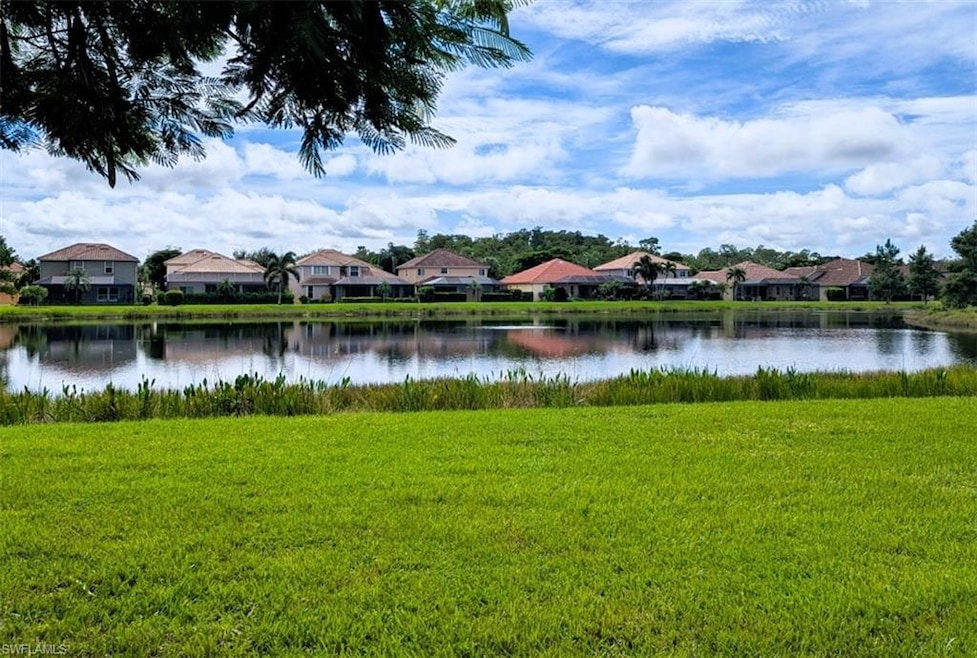 Water view featuring nearby suburban area