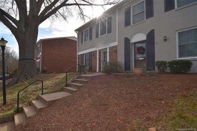 Enjoy this END unit with mature shade tree at the 