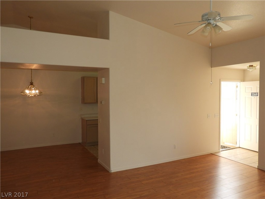Large open living/dining area leading into the kit