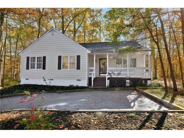 Located on a cul-de-sac lot with a paved driveway,