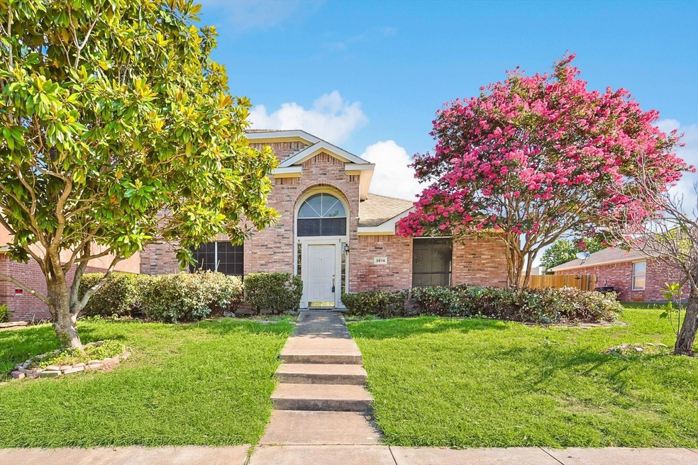 View of front of home with a front yard