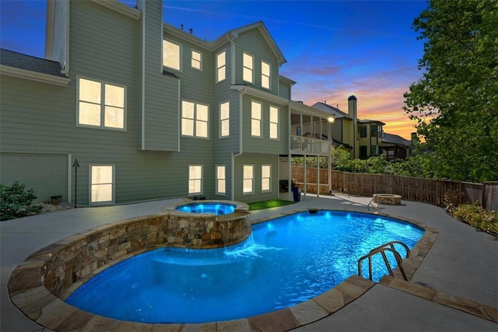 Twilight view of pool
