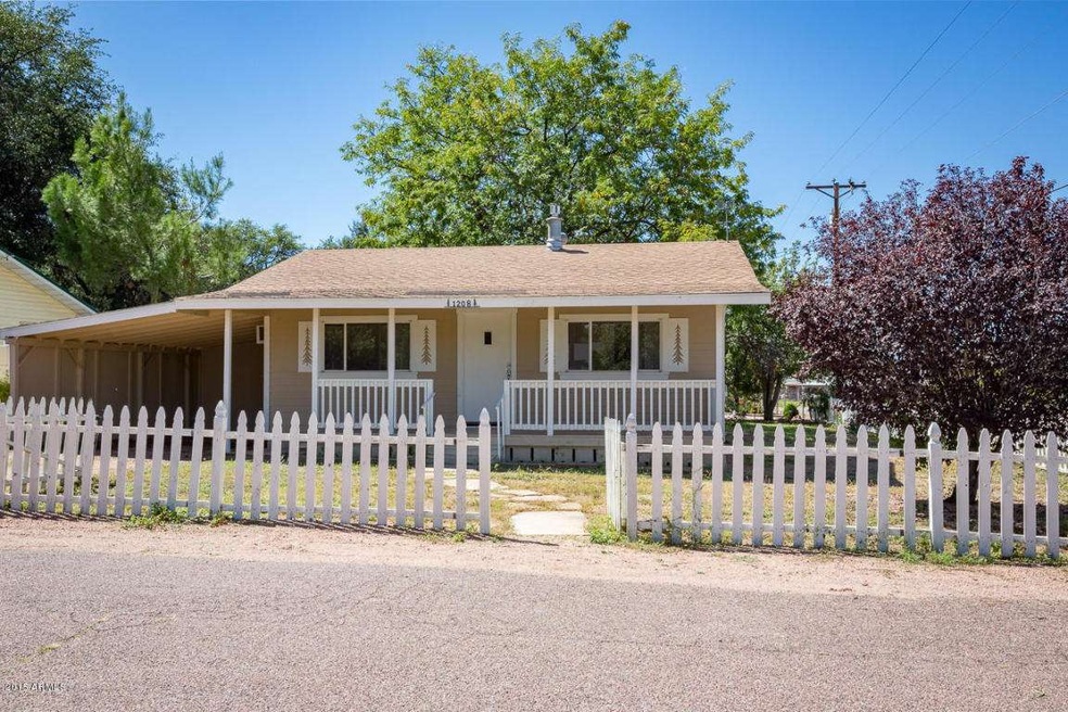 Front of Home with White Picket Fence