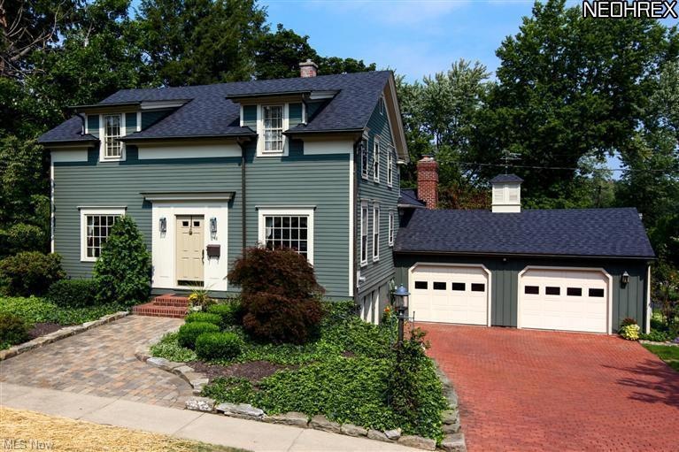 Splended front elevation photo. Home offers a Home