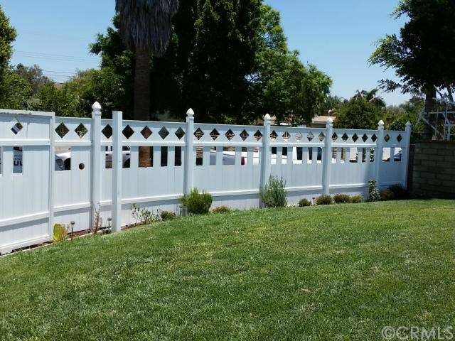 Upon entry you see a Rich Green Lawn, Unique Fenci