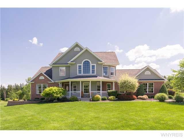 Exterior Front Custom built home on six majestic a