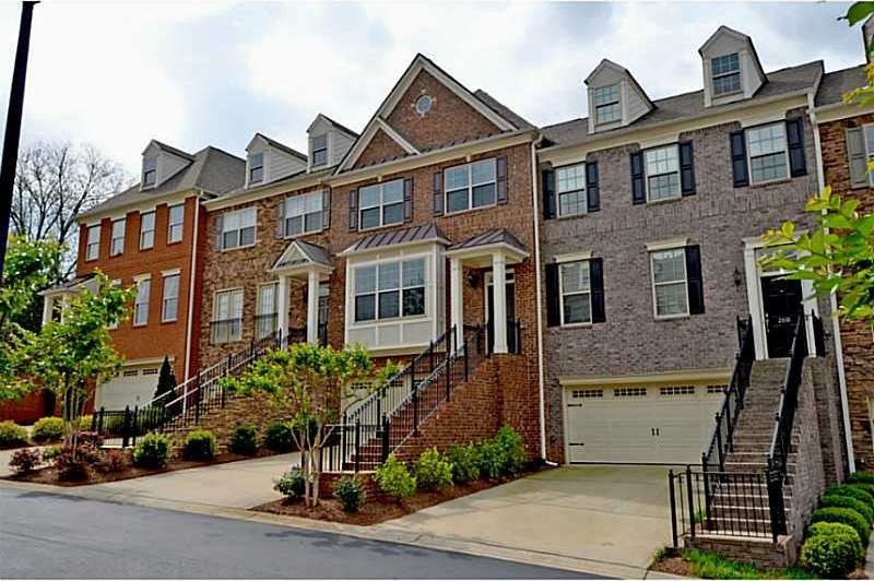 Exterior Front. Gorgeous 4 Side  Brick Townhome lo