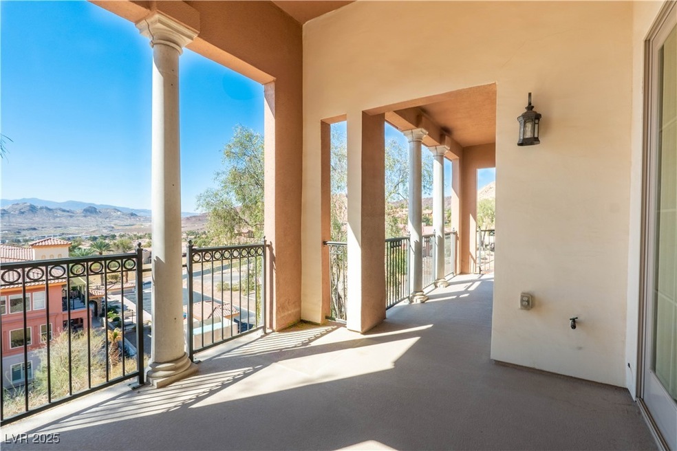 View of patio featuring a mountain view and a balc