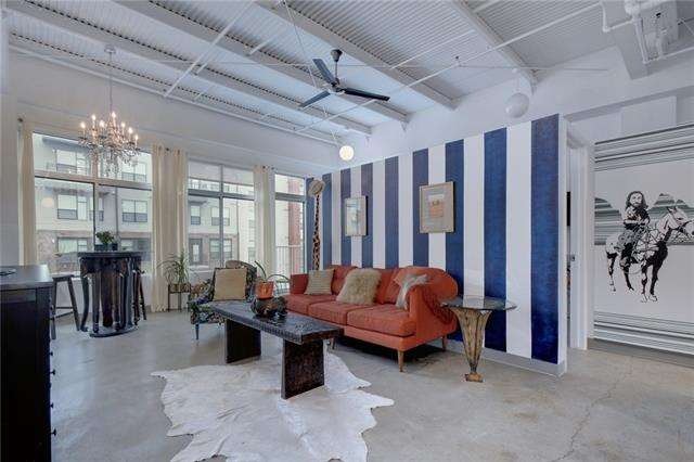The spacious main living area features high ceilin