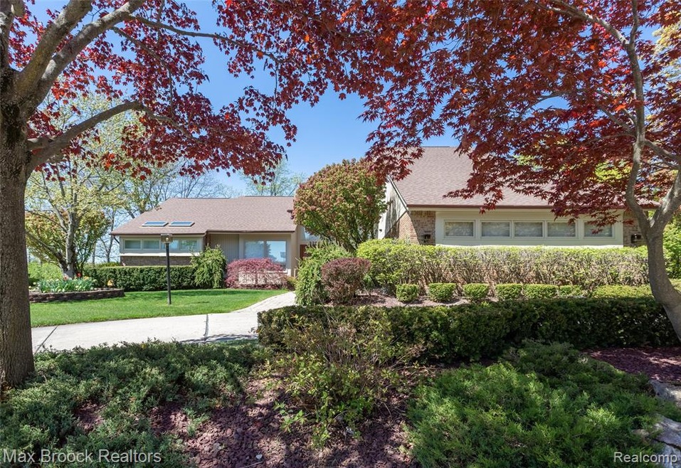 Lush Mature Landscaping Surrounds This Stunning So