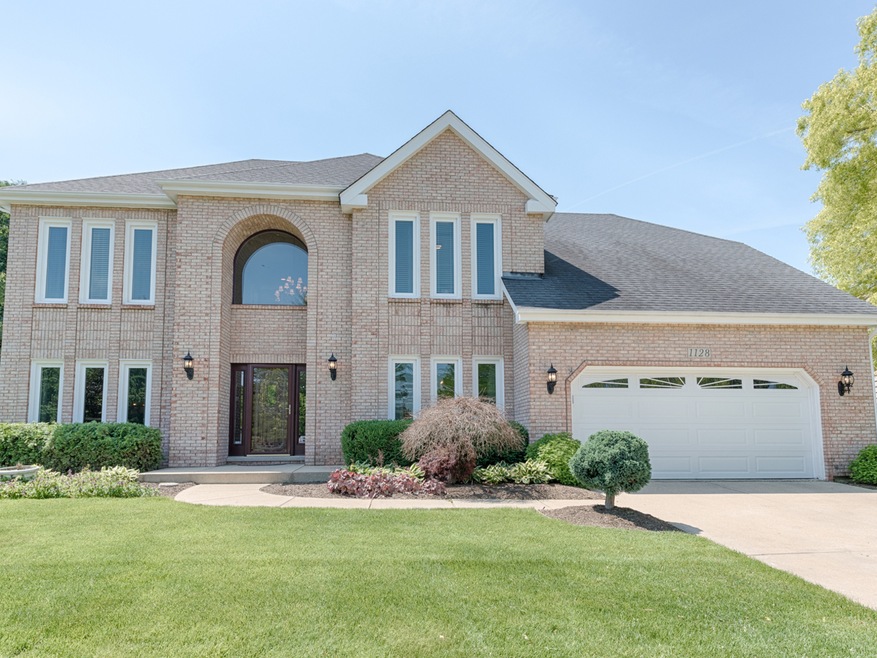 Brick front with professional landscaping