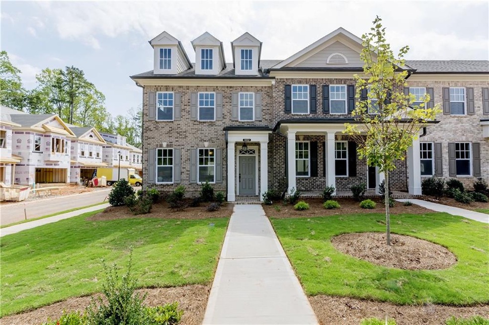 PHOTO OF COMPLETED HOME OF SAME FLOORPLAN, NOT THI