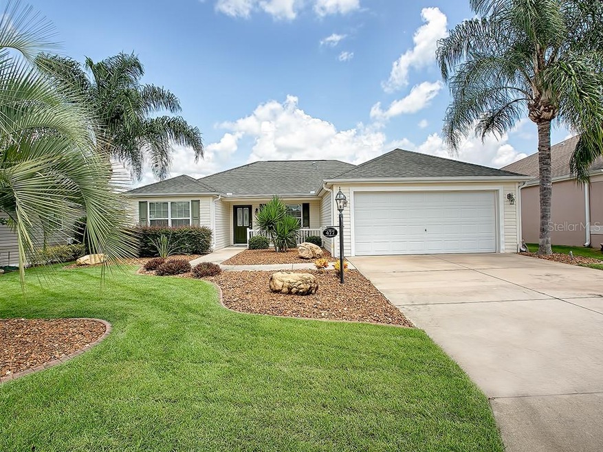 GREAT CURB APPEAL WITH MANICURED LAWN AND CURBED L