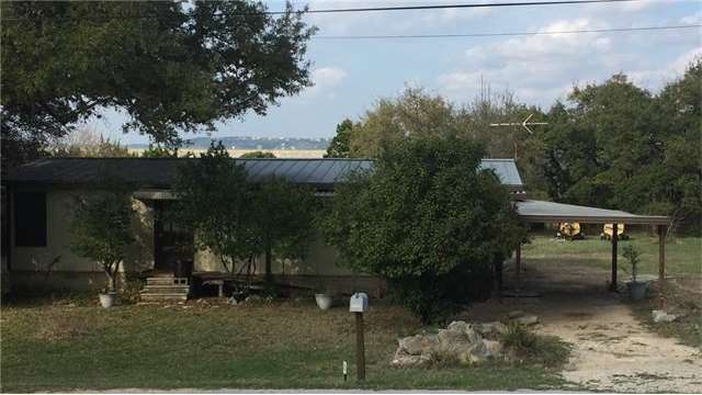 Mansfield Dam and hills of Lake Travis in backgrou