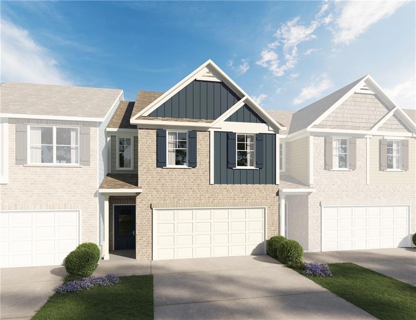 View of front of property with a garage