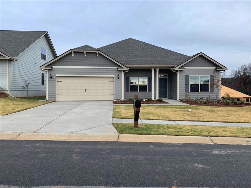 View of front of home featuring an attached garage