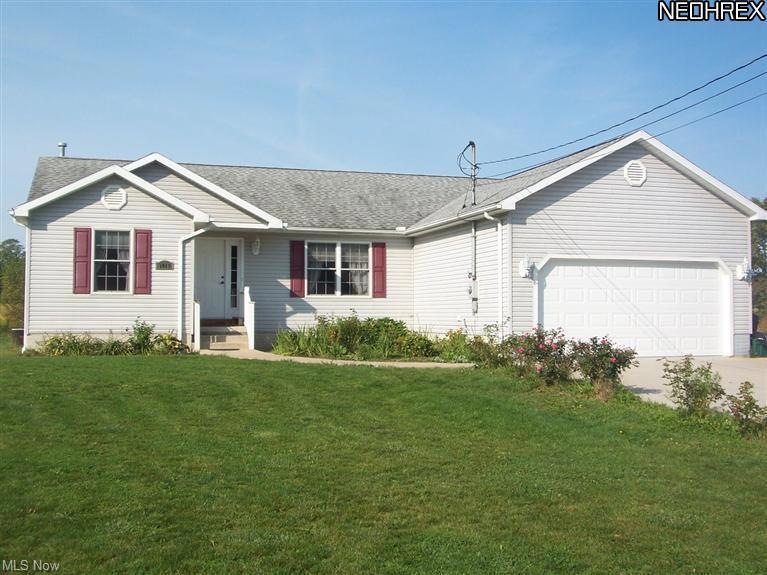 1017 Evening Star Dr, Roaming Shores, OH 44085 - photo 1