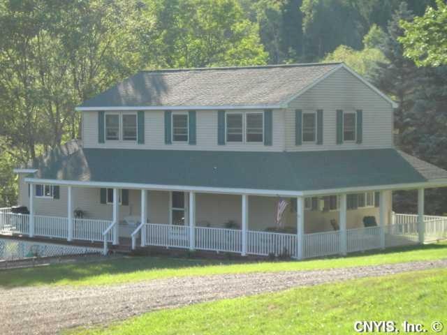 Exterior Front Great Porch just hugs this honey of