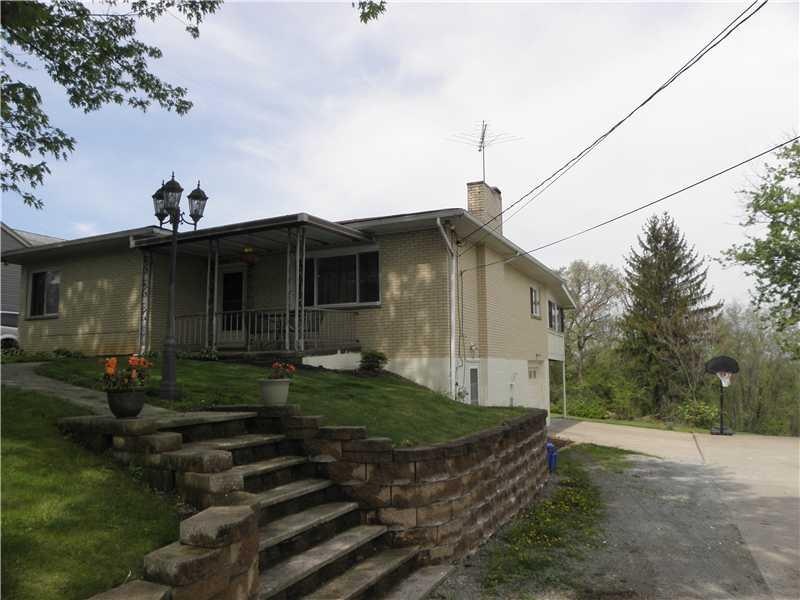 Exterior Front. Spacious Brick Ranch on 60x242 Lot
