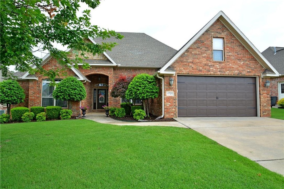 Great curb appeal with mature landscaping! New ins